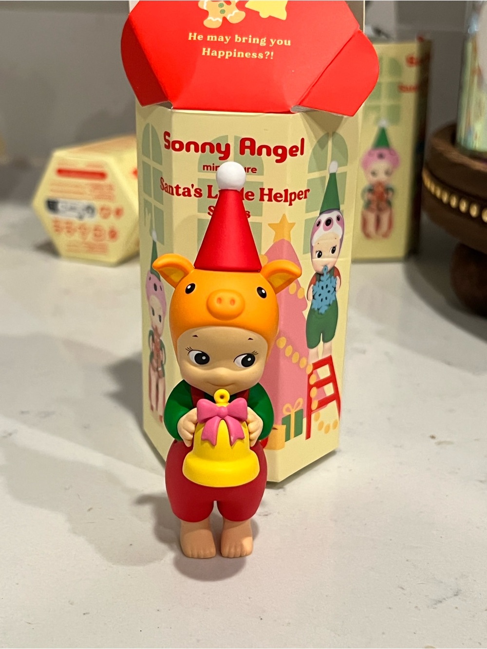 Sonny Angel Holiday Helper Figure - Orange Pig Hat with Red Outfit